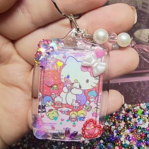 Handmade Hello Kitty Sanrio 2 sides keychain with charms and strawberries
